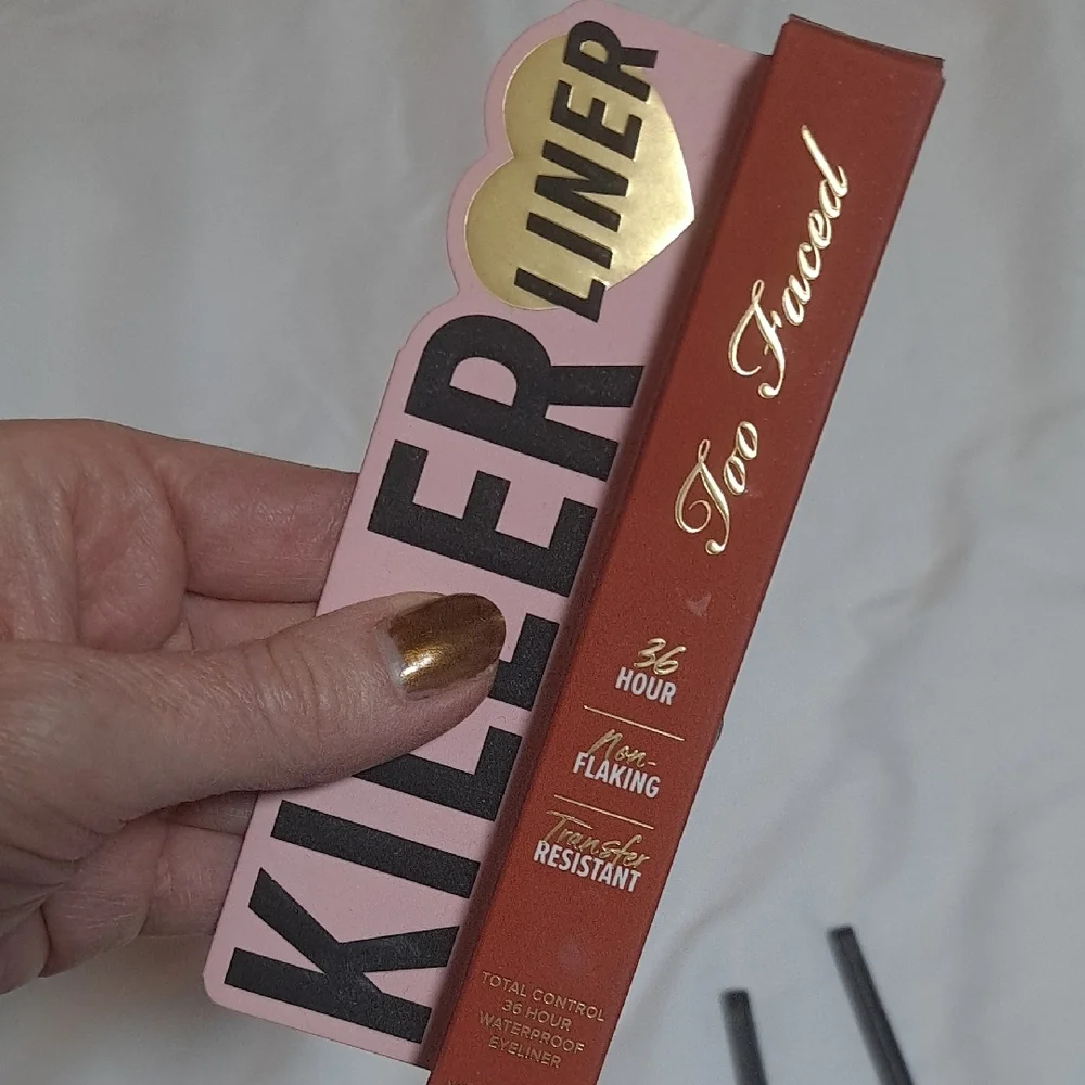 Too Faced Killer eyeliner in Gingerbread, plus two more liners in black and blue